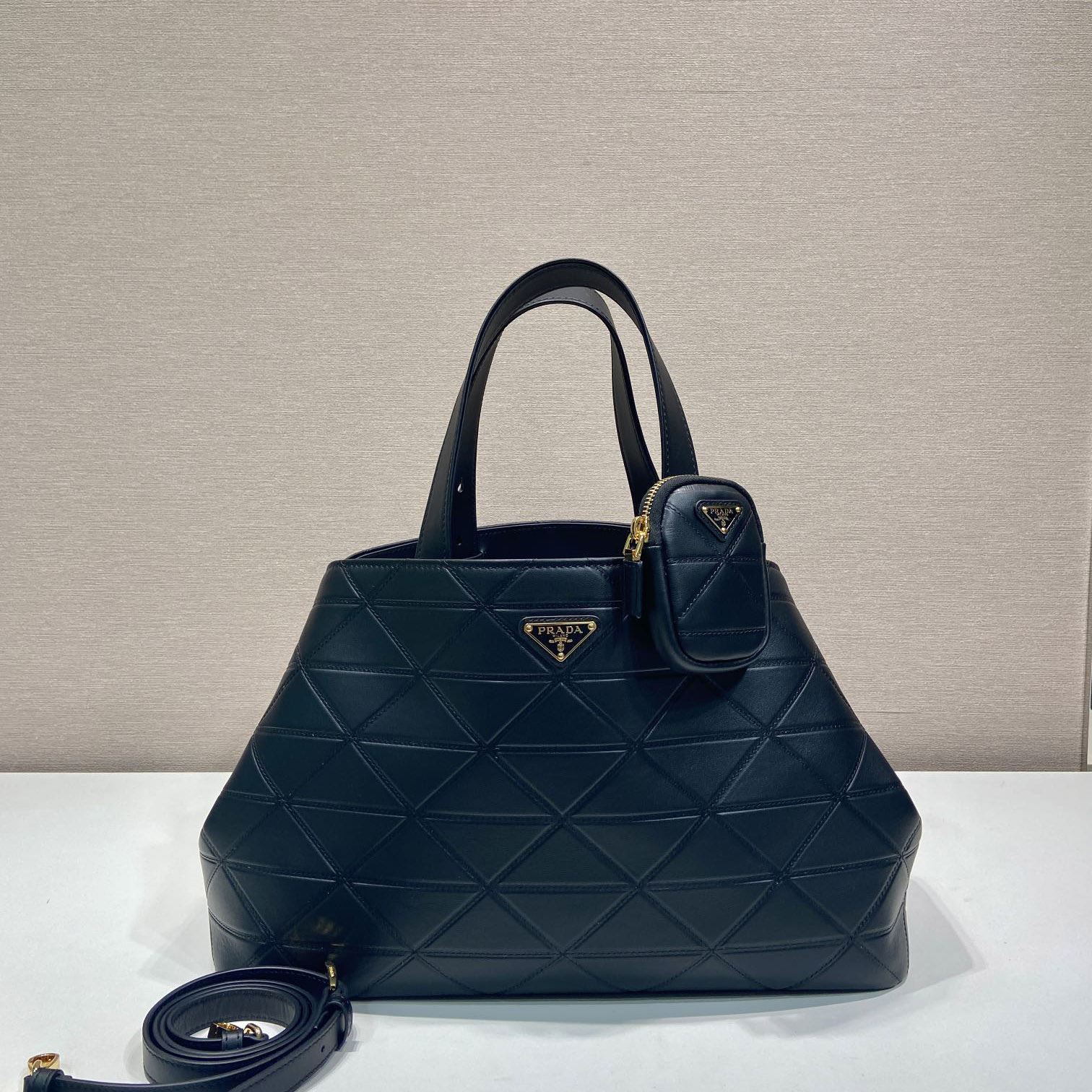 Pra*a top handle bags